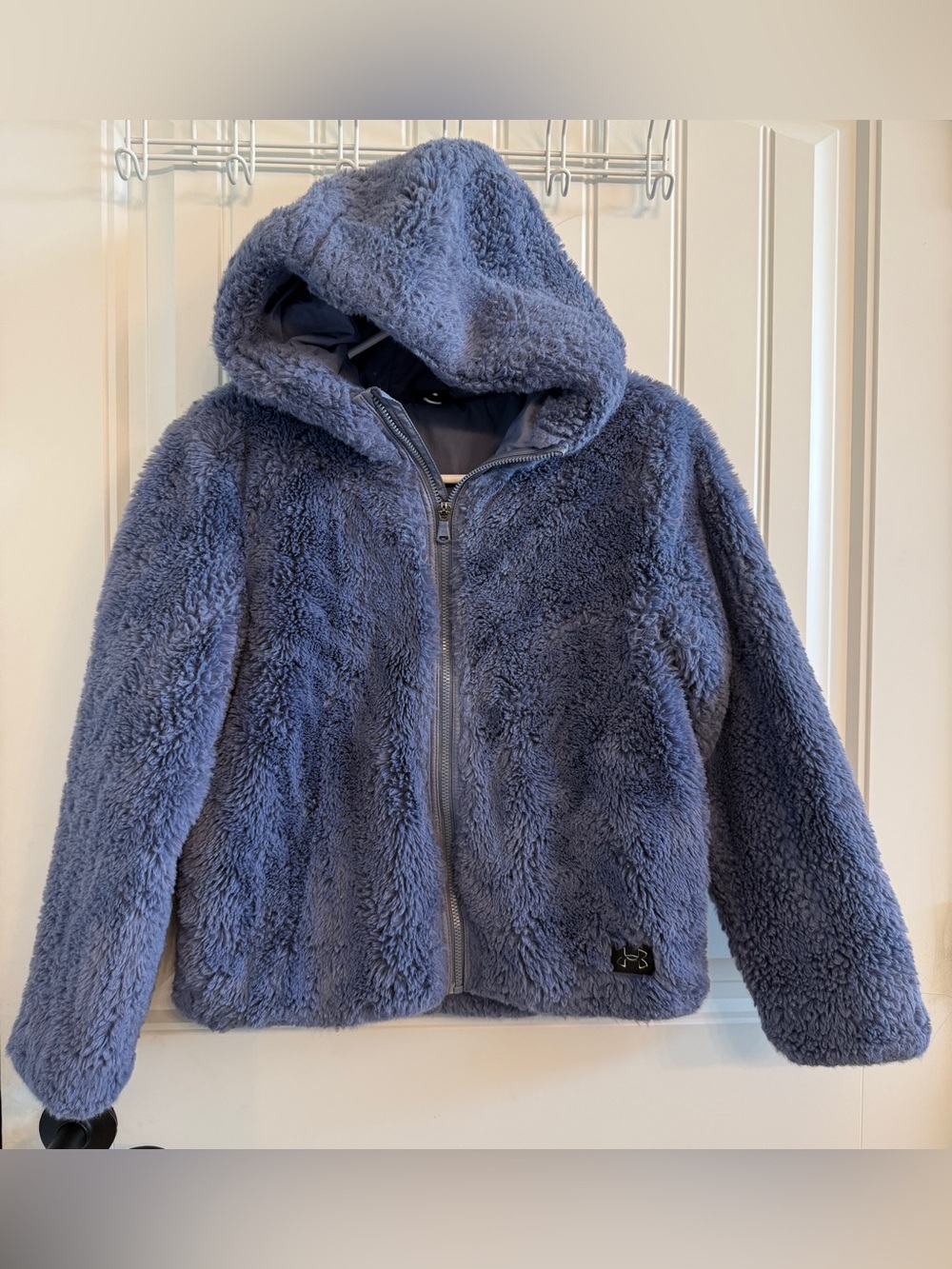 Under Armour youth XL full zip up plush hooded jacket.